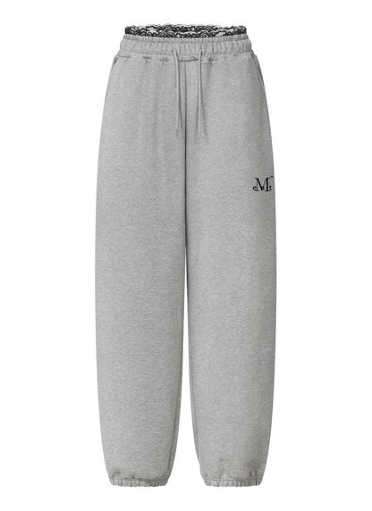 MUCENT ASTO LACE SAGGING JOGGER PANTS 蕾絲拼接落檔縮口褲 2色