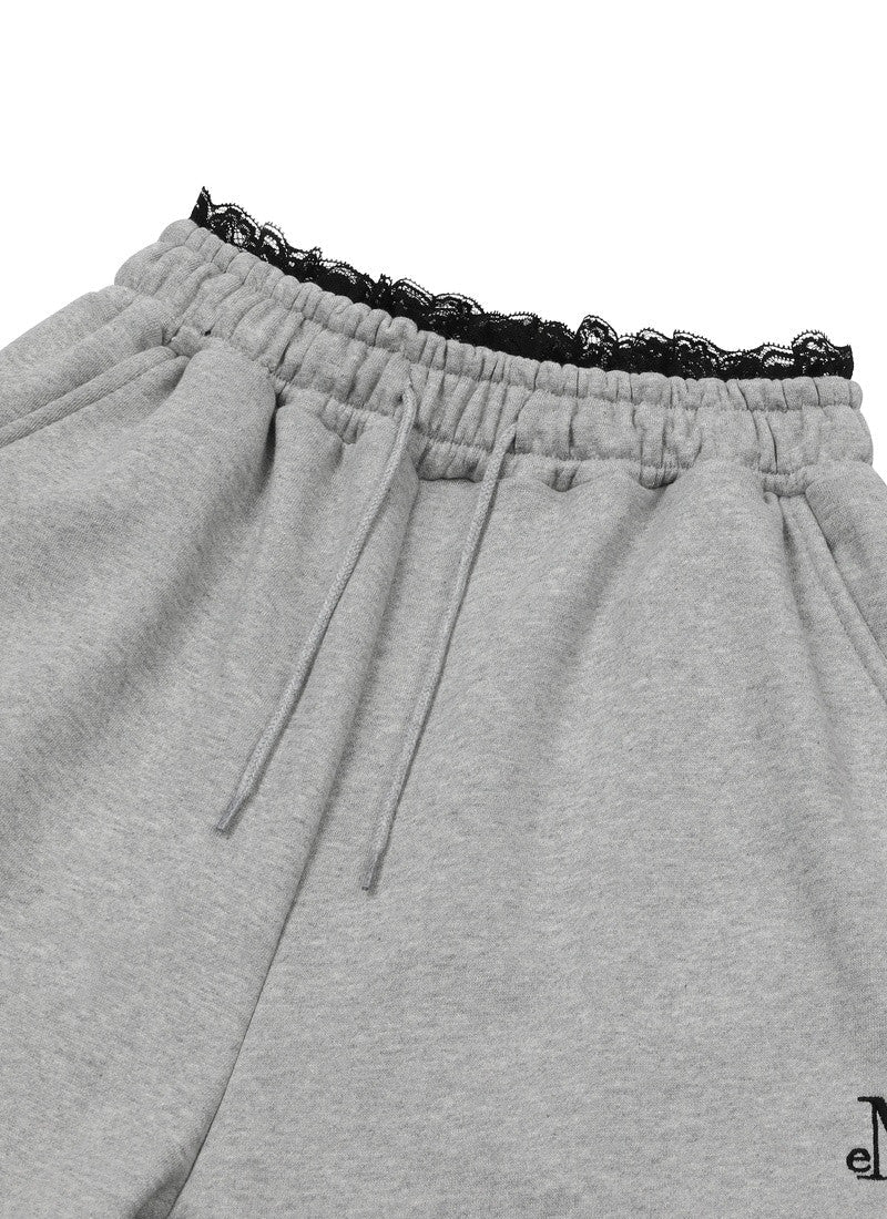 MUCENT ASTO LACE SAGGING JOGGER PANTS 蕾絲拼接落檔縮口褲 2色